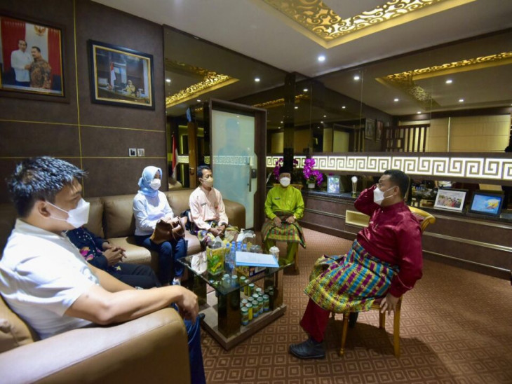 Bupati Kampar Sambut Kunjungan Staf Khusus Menteri Kelautan dan Perikanan.