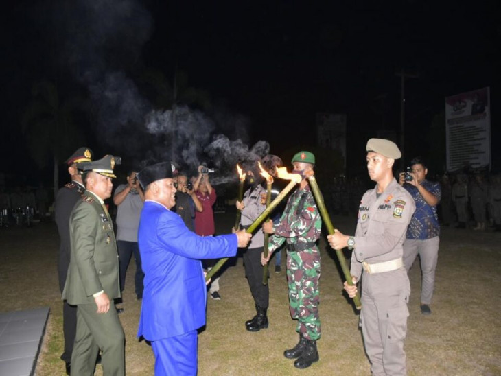 Ikuti Apel Taptu dan Pawai Obor, Sekda Kampar ; Bentuk Perjuangan Bangsa Indonesia. 