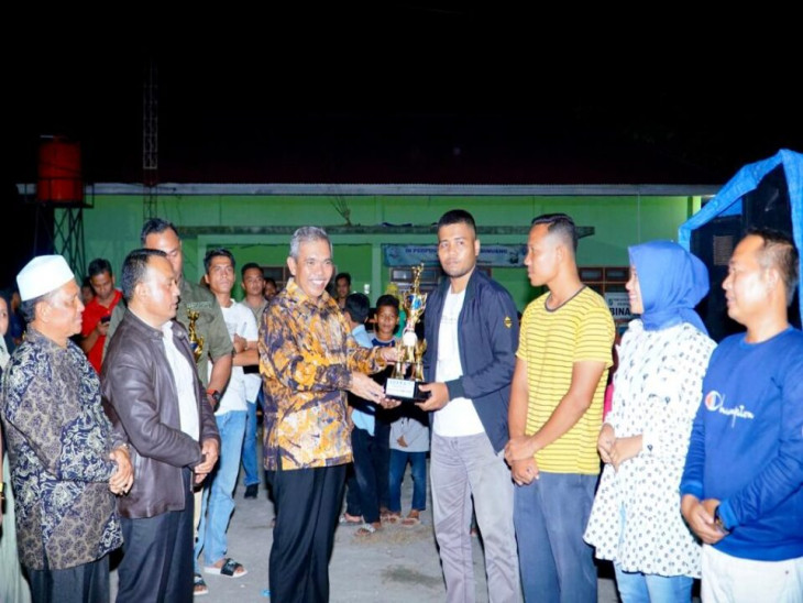 Pj.Bupati Kampar Hadiri Festival Seni Budaya Dan Penutupan Turnamen Bola Voli Antar Desa Se – kecamatan Bangkinang.