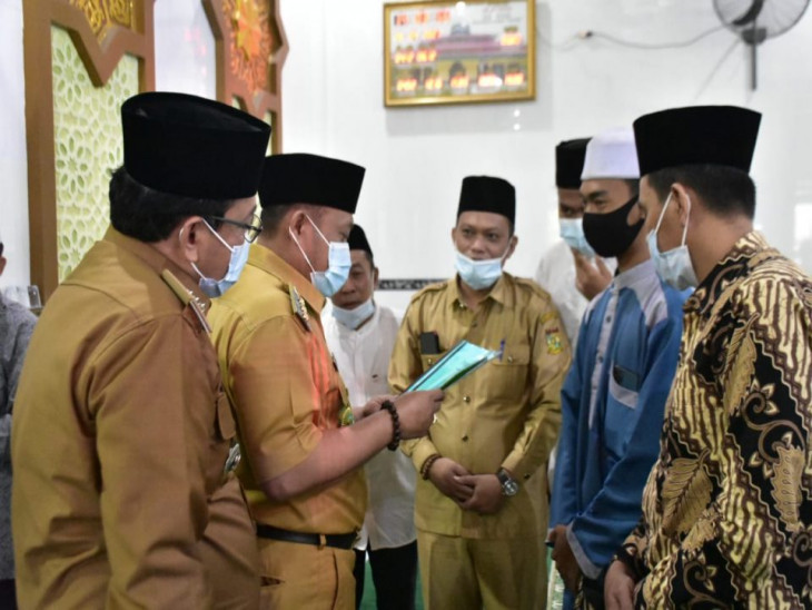 Bupati Kampar; Dua tahun Covid-19, Kita harus iklas dan Bersabar