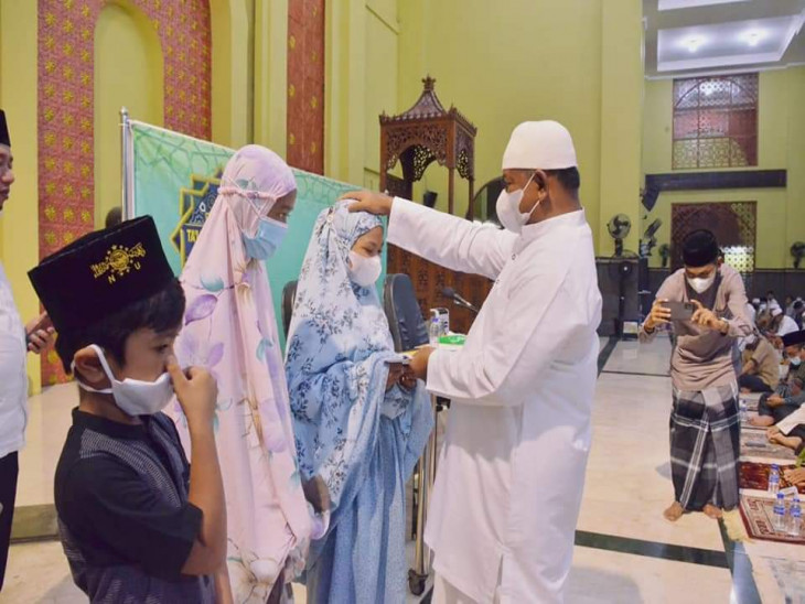 Pemkab Kampar Peringati Nuzul Al-Qur’an dengan Menyantuni Anak Yatim