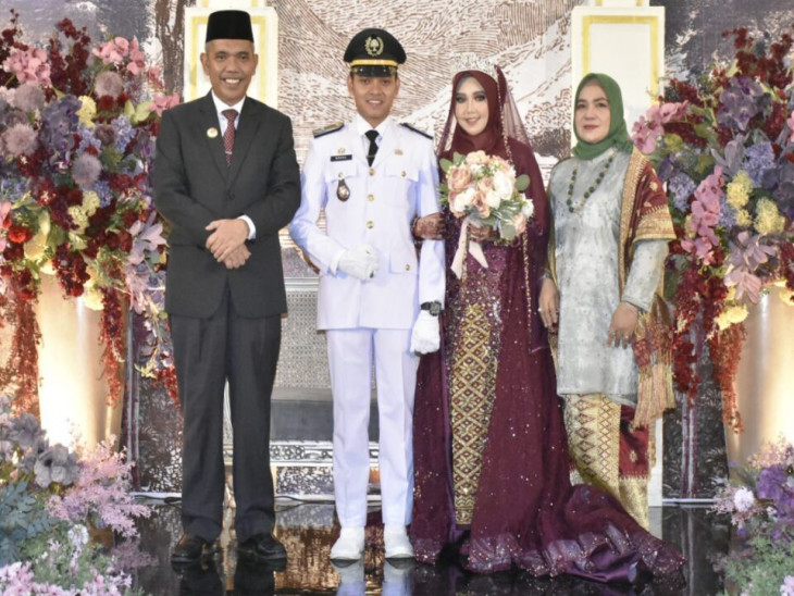 Usai Jadi Saksi Nikah, Pj. Bupati Kampar Pimpin Upacara Pedang Pora Pesta Lurah Batu Bersurat