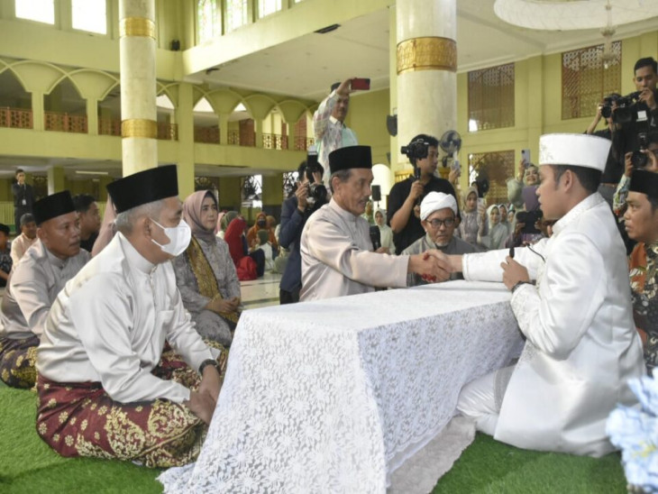 Pj Bupati Kampar Jadi Saksi Nikah Ahmad Noval Ajudan Pribadi Pj Bupati Kampar.