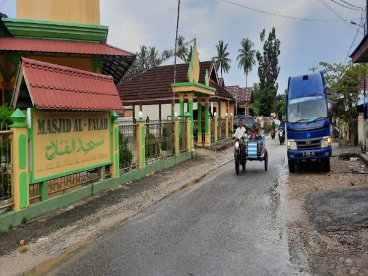 Walaupun di Guyur Hujan, Diskominfo Kampar Tetap Sosialisasikan Penerapan Protkes di Dua Kecamatan