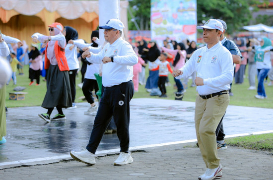 Kadiskominfo Kampar Lukmansyah Badoe Hadiri dan Dukung Suksesnya Gerak Jalan Hari Buruh Internasional